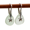 Shaped only by the sea, these natural sea glass pieces really glow hanging from these solid sterling silver leverbacks.