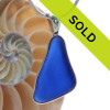 A perfect piece of Vivid Blue Genuine Sea Glass with in our signature Deluxe Wire Bezel© pendant setting that leaves both front and back open and the glass unaltered from the way it was found on the beach.
Sorry this sea glass jewelry piece has been sold!