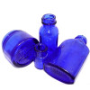 Many commercial products used to come in cobalt blue glass. Noxzema, Phillips, Bromo Seltzer, Vick's Vapor Rub and Evening In Paris just to mention a few.