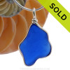 A LARGE irregular perfect piece of Cobalt Blue Genuine Sea Glass with in our signature Original Wire Bezel© pendant setting.
Sorry this sea glass jewelry selection is no longer available.