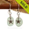 A perfect matched pair of beautiful seafoam green Sea Glass Earrings combined with solid sterling starfish charms and a setting that leaves much of the beauty of these sea glass pieces shine.
SOLD - sorry this Sea Glass Jewelry selection is no longer available.