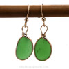 A classic and timeless sea glass earrings setting in gold.