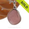 A good quality plum sea glass from Maine in our Original Wire Bezel Pendant Setting© that leaves the sea glass UNALTERED from the way it was found on the beach. 
SOLD - Sorry this Ultra Rare Sea Glass Pendant is NO LONGER AVAILABLE!