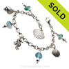 4 pieces of mixed vivid aqua  genuine beach found sea glass combined with solid sterling beach inspired charms in a totally solid sterling silver bracelet.
SOLD - Sorry this Sea Glass Charm Bracelet is NO LONGER AVAILABLE!