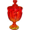 Pictured Here - Amberina Vase
Amberina is the name of a type two-toned glassware, which was originally made from 1883 to about 1900. Amberina was patented by Joseph Locke of the New England Glass Company, and was produced extensively there. It was also produced a lot by the successor company the Libbey Glass Company at Toledo, Ohio, into the 1890s.