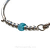 A detail of this sea glass bangle bracelet shows you the stunning aqua sea glass.