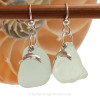 Large pieces of seafoam green sea glass pieces set with LARGE sterling seahorse charms on sterling silver hook earrings.