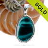 This rare Seaham mixed vivid teal sea glass multi color pendant is set in our Deluxe Wire Bezel© pendant setting.
SOLD - Sorry this Ultra Rare Sea Glass Pendant is NO LONGER AVAILABLE!