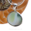 The B side is partially opalized and partially translucent. This sea glass is highly sought after. 