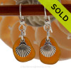 Perfect brown Genuine Sea Glass Earrings combined with Solid Sterling Sea Shell charms.
SOLD - Sorry these Rare Sea Glass Earrings are NO LONGER AVAILABLE!