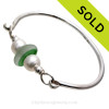Mixed Spring Green English Flashed Sea Glass combined with real cultured pearls on this Solid Sterling Silver Full round Sea Glass Bangle Bracelet.
SOLD - Sorry this Sea Glass Bangle Bracelet is NO LONGER AVAILABLE!