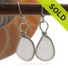 Perfect Pure White Sea Glass Earrings in our Original Wire Bezel© setting in solid sterling silver.