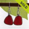 TOP QUALITY Ruby Red Genuine Sea Glass in our classic set our Original Wire Bezel© earring setting lets all the color of these beautiful gold set beach found sea glass pieces shine!

A beautiful match of deep Vivid Ruby Red sea glass from Puerto Rico. Red is the hope diamond of sea glasses and this perfect pair is a treasure for any sea glass lover..... Distinctive, simple and elegant!