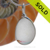 Ultra Rare white endoday sea glass from England with every color fused inside and set in our Original Wire Bezel© necklace pendant setting.
SOLD - Sorry this Rare Sea Glass Pendant is NO LONGER AVAILABLE!