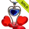 A beautiful small and rare Mixed Blue Multi color natural sea glass heart set in our deluxe wire bezel pendant setting! 
Genuine sea glass hearts are a RARE phenomena and cherished among sea glass lovers!
SOLD - Sorry this Rare Sea Glass Pendant is NO LONGER AVAILABLE!