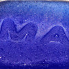 A detail of this Genuine Sea Glass Jewelry piece shows you the telltale "C"'s that indicate it is naturally aged and UNALT