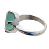 A perfect natural and unaltered sea glass piece set in a solid sterling ring
