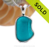 Electric Teal Embossed Natural Beach Found Sea Glass In Deluxe Sterling Bezel© Necklace.
SOLD - Sorry this Rare Sea Glass Pendant is NO LONGER AVAILABLE!