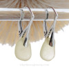 A pair of small or petite beach found Genuine Sea Glass Earrings in a soft pale yellow  on solid sterling leverbacks.