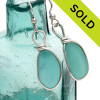 Round and Thick pieces of natural Vivid Aqua Green sea glass set in our Original Wire Bezel© earring setting.
Unaltered genuine sea glass from Seaham England and the site of former glass factories that discarded glass into local waters.