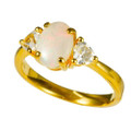   *    A SUNBEAM 18KT YELLOW GOLD PLATED & TOPAZ AUSTRALIAN WHITE OPAL RING