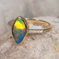 * A MYSTICAL VEIL 14KT YELLOW GOLD & DIAMOND AUSTRALIAN OPAL RING