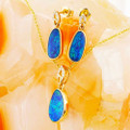 * A CRYSTAL OCEAN 14KT GOLD & DIAMOND AUSTRALIAN OPAL MATCHING SET