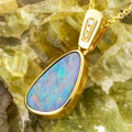 * A MAGIC MOMENT 14KT YELLOW GOLD & DIAMOND AUSTRALIAN OPAL NECKLACE