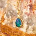 Solar Embrace 14kt Gold Opal Pendant