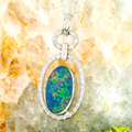 * 1 CELESTIAL RADIANCE 18KT WHITE GOLD & DIAMOND HALO GEM QUALITY OPAL PENDANT