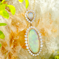 * A PASSIONATE LOVE 18KT GOLD & DIAMOND WHITE OPAL PENDANT
