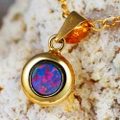 * A HOLIDAY FLASH 14KT GOLD AUSTRALIAN OPAL NECKLACE