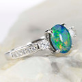 * 1 A UNIVERSE BLOOM STERLING SILVER AUSTRALIAN OPAL RING