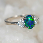  *A SKI HOUSE STERLING SILVER AUSTRALIAN OPAL RING