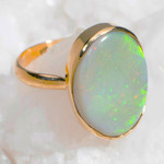  *   ELECTRIC PINFIRE 14KT YELLOW GOLD AUSTRALIAN OPAL RING