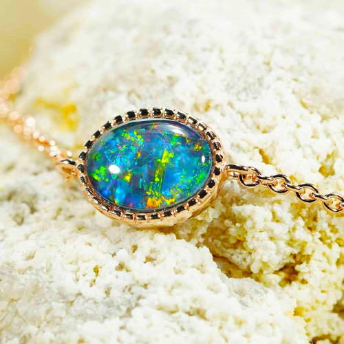 GLEAMING TRINKETS 18KT ROSE GOLD PLATED AUSTRALIAN OPAL BRACELET