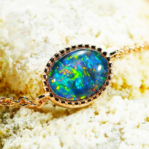 GLEAMING TRINKETS 18KT ROSE GOLD PLATED AUSTRALIAN OPAL BRACELET