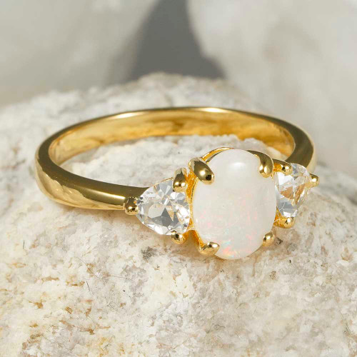   *    A SUNBEAM 18KT YELLOW GOLD PLATED & TOPAZ AUSTRALIAN WHITE OPAL RING