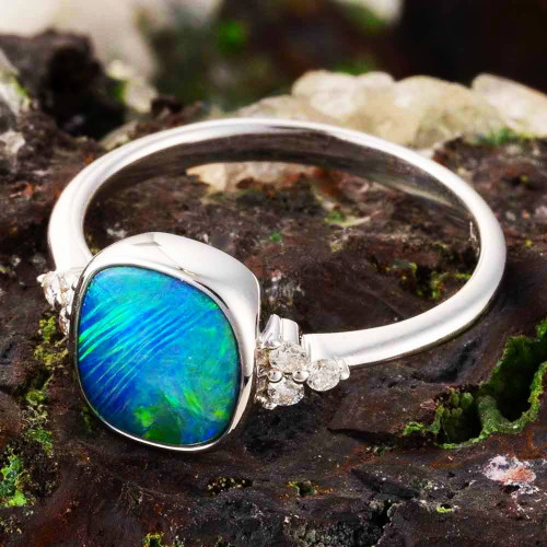 * AN OCEAN DEPTH 14KT WHITE GOLD & DIAMOND AUSTRALIAN OPAL RING