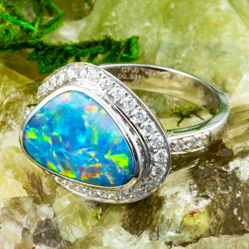 * A CELESTIA IGNIS 18KT WHITE GOLD & DIAMOND AUSTRALIAN OPAL RING