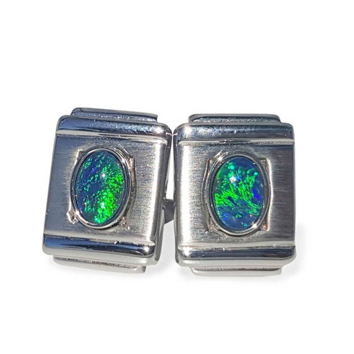 *  A STERLING SILVER & GOLD PLATED OPAL CUFF LINKS WITH GREEN FLASH
