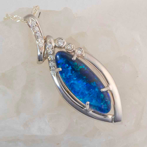 * A CRYSTAL MOUNTAIN 18KT WHITE GOLD & DIAMOND AUSTRALIAN SOLID BLACK OPAL NECKLACE