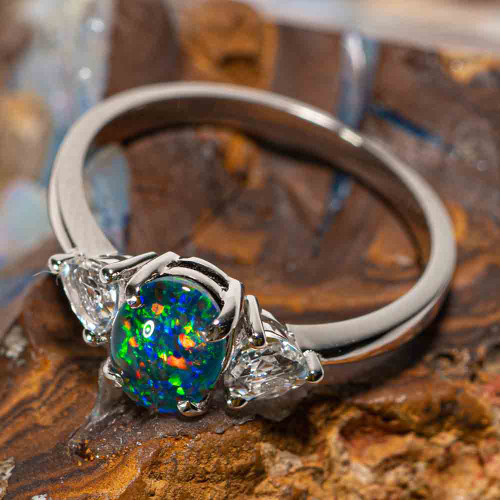 *A QUEEN'S REIGN STERLING SILVER AUSTRALIAN OPAL RING