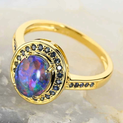 A CARAMELIZED CANDY 18KT GOLD PLATED AUSTRALIAN OPAL RING