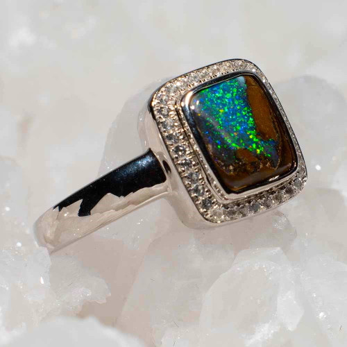 * A STARRY SKY STERLING SILVER AUSTRALIAN BOULDER OPAL RING