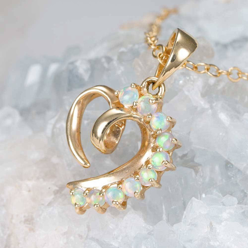 A LOVE AMORE 14KT YELLOW GOLD AUSTRALIAN WHITE OPAL NECKLACE