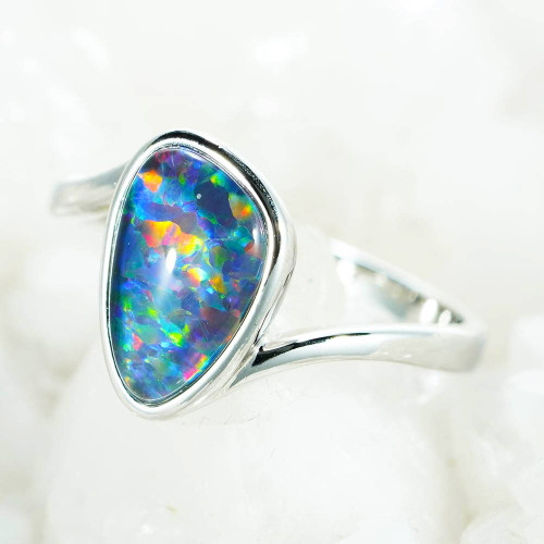 * A POLAROID STERLING SILVER AUSTRALIAN OPAL RING