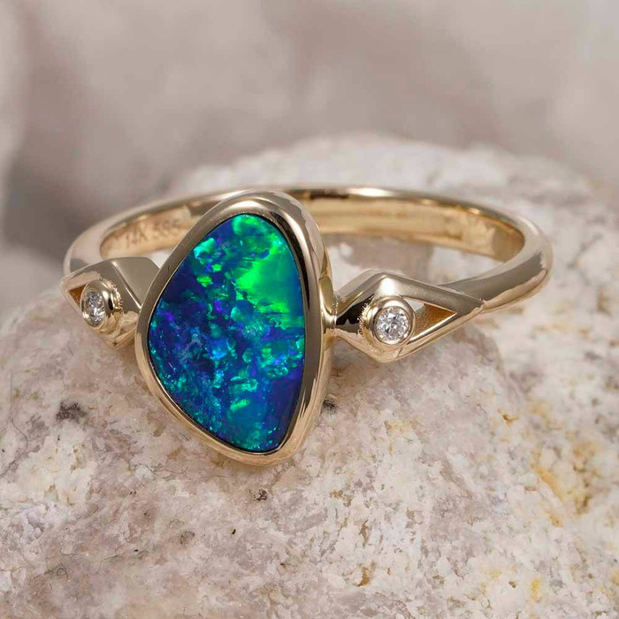 * A LAGOON LOTION 14KT YELLOW GOLD & DIAMOND AUSTRALIAN OPAL RING