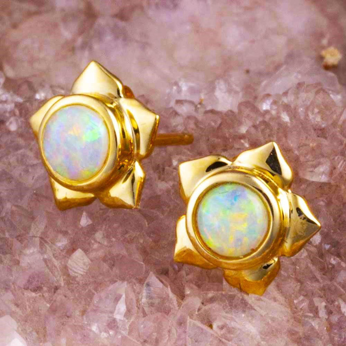 A TWILIGHT TRINKETS 14KT GOLD WHITE OPAL STUD EARRINGS