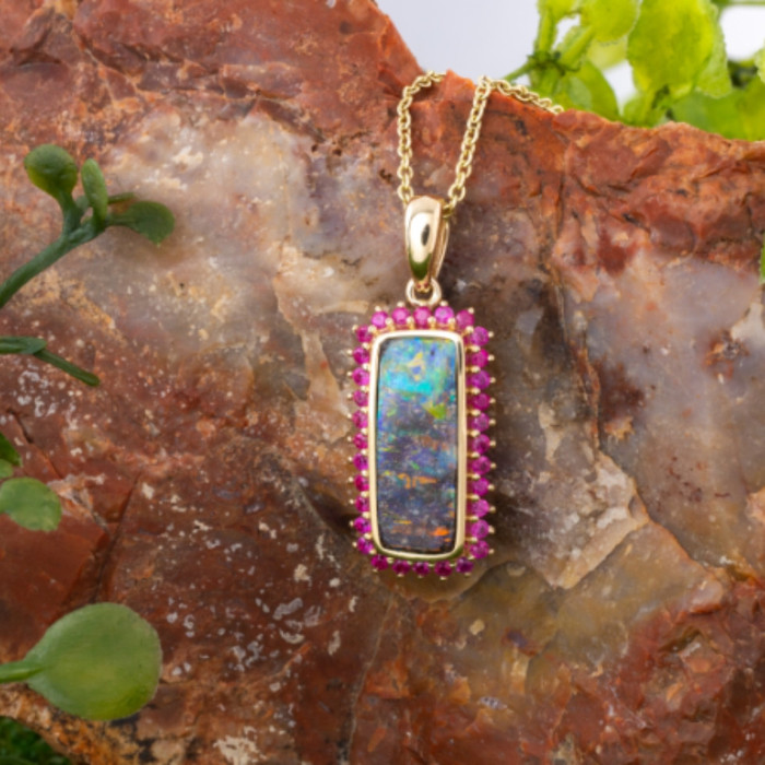 * 1 A RAINBOW INFERNO 14KT GOLD GEM QUALITY SOLID OPAL PENDANT